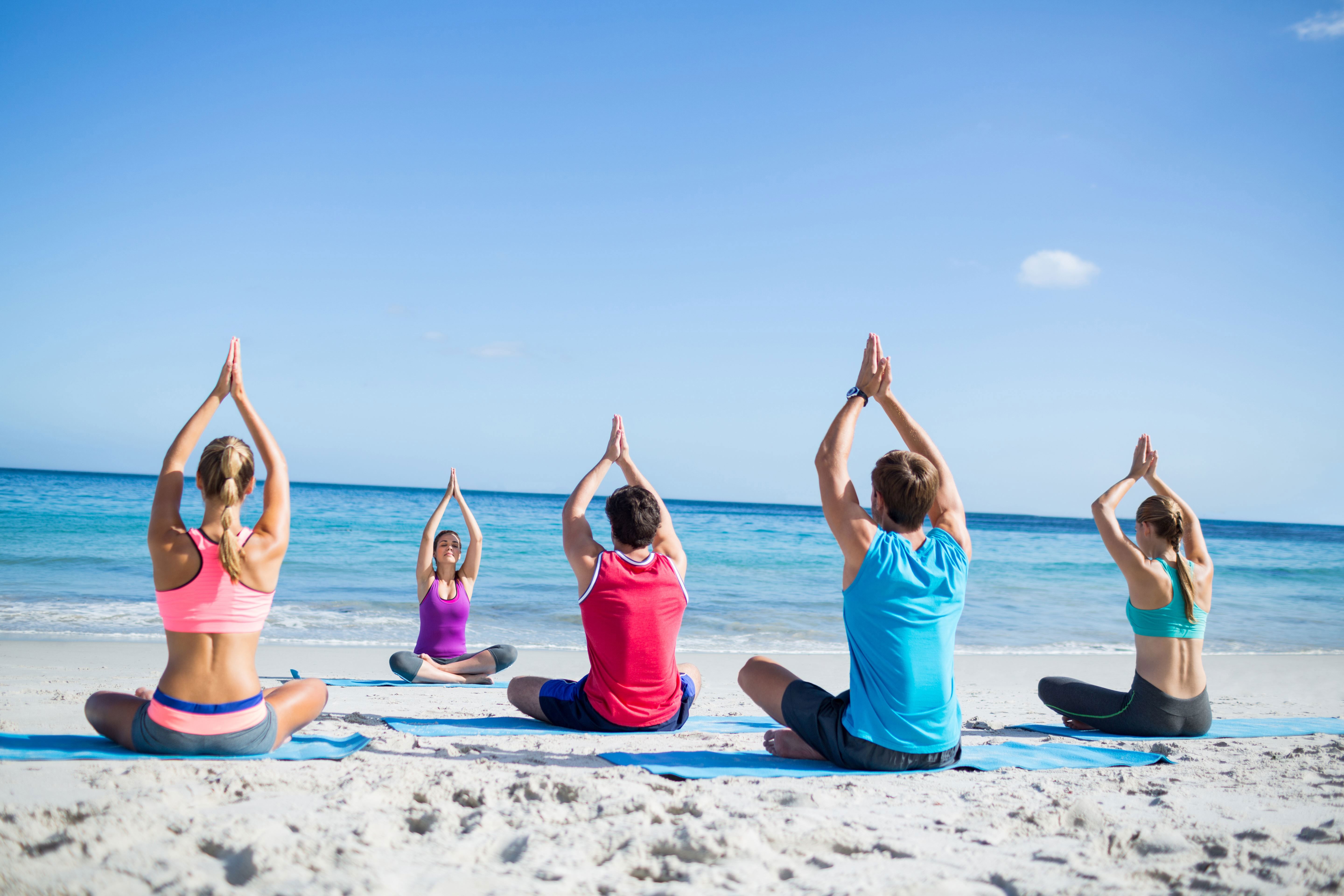 Yoga on the beach in the Algarve